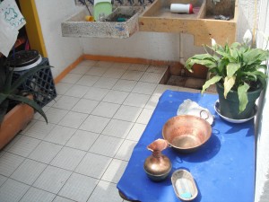 A beautiful brass set of pictcher and bowl for small children to wash their hands with in the Montessori school's environment "Children's House"